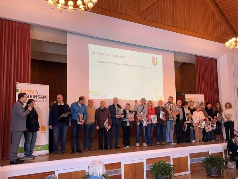 Geehrte und Vereinsvorsitzende beim Neujahrsempfang